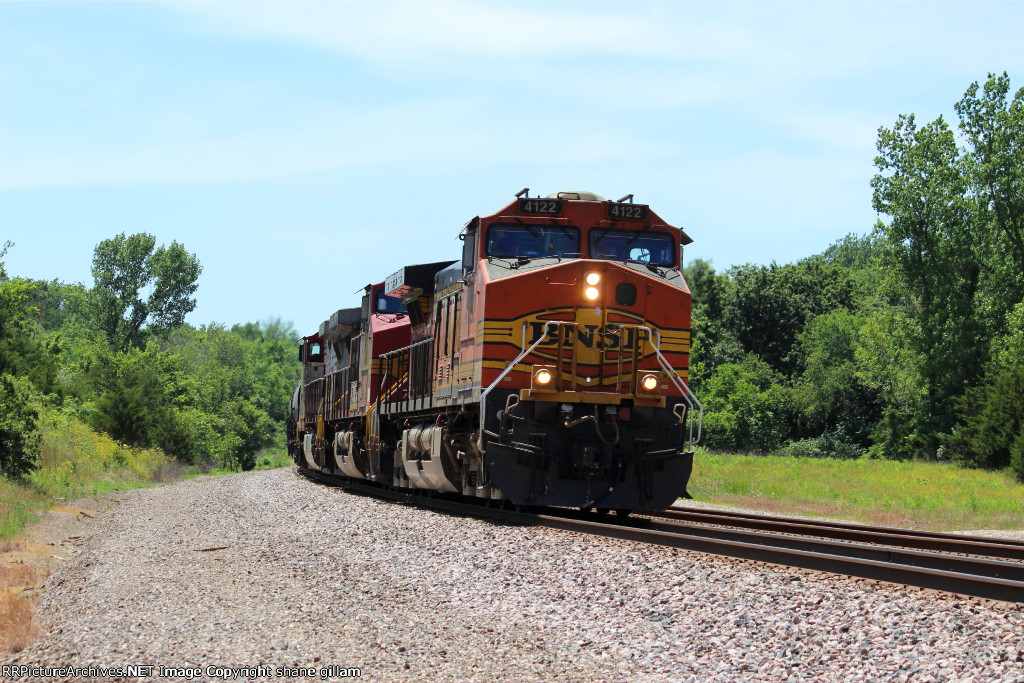 BNSF 4122 leads a EB Freight train with 2 Fake bonnets.